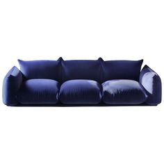 a blue couch with four pillows on the back and one pillow in the middle, against a white background