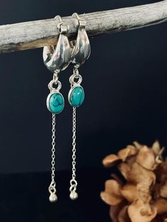 **Adorn your ears with the vibrant elegance of our sterling silver hoop earrings, featuring a charming turquoise gemstone as the centerpiece. The hoops are crafted from high-quality sterling silver, offering a timeless look that complements any style. The turquoise gemstone adds a pop of color and a touch of bohemian flair, making these earrings the perfect accessory for any occasion. Whether you're dressing up for a night out or adding a chic accent to your everyday ensemble, these earrings are Teardrop Turquoise Nickel-free Hoop Earrings, Turquoise Teardrop Nickel-free Hoop Earrings, Nickel-free Teardrop Turquoise Hoop Earrings, Nickel-free Turquoise Teardrop Hoop Earrings, Turquoise Teardrop Hoop Earrings Nickel Free, Nickel-free Turquoise Dangle Hoop Earrings, Turquoise Dangle Hoop Earrings Nickel Free, Turquoise Dangle Hoop Earrings, Turquoise Sterling Silver Hoop Earrings For Pierced Ears