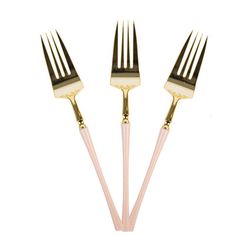 three forks with gold colored handles and two pink tips on each fork are shown in front of a white background