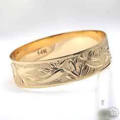 Bird of paradise gold bracelet Traditional Ceremonial Jewelry With Engraving Option, Engraved 14k Gold Jewelry Thick Band, 14k Gold Engraved Jewelry With Thick Band, Engraved Yellow Gold Thick Band Jewelry, Ceremonial Yellow Gold Jewelry With Engraving Option, Etched Yellow Gold Bracelet, Traditional Wide Band Engraved Jewelry, Traditional Engraved Wide Band Jewelry, Traditional Gold Jewelry With Engraving Option