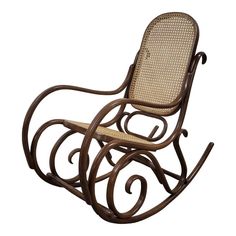 a wooden rocking chair with wicker seat and armrests on an isolated white background