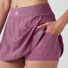 Nwt Alo Yoga Match Point Tennis Skirt In Soft Mulberry, Size Small. Sold Out Color. Will Come In Original Packaging! Smoke Free Home. I Ship Next Day! Purple Skort With Built-in Shorts, Purple Skort, Tennis Skirt Black, Yoga Skirt, Elastic Skirt, Match Point, Skirt Trends, Alo Yoga Pants, Pleated Maxi Skirt