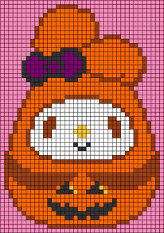 a cross stitch pattern of a bear wearing a pumpkin costume