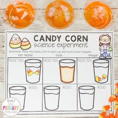 candy corn science experiment for kids with orange candies on the side and an orange drink in