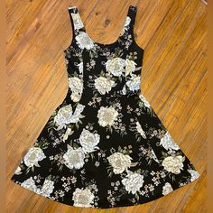 Brand New With Tags Women’s Size 4 Casual Stretch Sundress With Floral Print, Black Floral Print Cotton Sundress, Black Cotton Sundress With Floral Print, Fitted Black Sleeveless Dress With Floral Print, Light Blue Floral Dress, Pink Satin Dress, Sheer Mini Dress, Tie Dye Mini Dress, Camo Dress