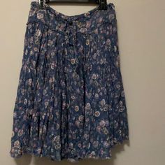 American Eagle Size Medium Skirt With Braided Tie And Distressed Hem Nwt/Never Worn. Casual Long Floral Print Pleated Skirt, Casual Long Pleated Floral Skirt, Casual Floral Print Pleated Flared Skirt, Casual Floral Print Midi Pleated Skirt, Casual Floral Print Pleated Midi Skirt, Casual Summer Pleated Skirt With Floral Print, Bohemian Lined Skirt For Daywear, Casual Floral Print Skirt For Daywear, Bohemian Knee-length Pleated Skirt