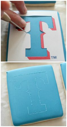 someone is cutting out the letter t from felt and then using scissors to make it