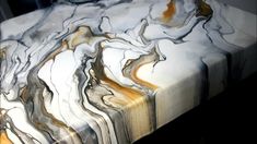 an artistic marble table top is shown in this image