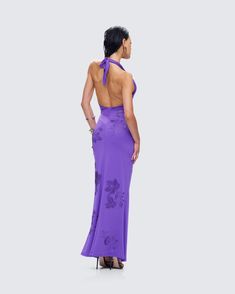 We see a dinner date in your future 😉 Dress to impress in this elegant yet sultry purple maxi dress made from jersey fabric and complete with a low plunge neckline, halter ties, and rhinestone detailing ✨💜 Glamorous Maxi Dress With Tie Back For Gala, Glamorous Evening Maxi Dress With Tie Back, Purple Maxi Dress For Prom, Purple Maxi Dress For Prom Season, Purple Fitted Backless Maxi Dress, Fitted Purple Backless Maxi Dress, Purple Halter Neck Maxi Dress For Party, Elegant Purple Sleeveless Halter Dress, Purple Summer Evening Dress For Gala