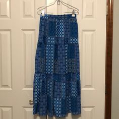 Blue Boho Flowy Skirt. Size Small. Never Worn. Bought For Festival Bohemian Blue Maxi Skirt For Beach, Blue Tiered Skirt For Vacation, Blue Skirted Bottoms For Vacation, Blue Tiered Maxi Skirt With Lining, Blue Tiered Lined Maxi Skirt, Blue Relaxed Fit Maxi Skirt For Vacation, Bohemian Skirted Bottoms In Blue, Bohemian Blue Skirted Bottoms, Blue Flowy Maxi Skirt For Beach