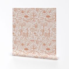 an orange and white wallpaper with trees on it