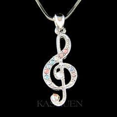 "Want a personalized gift? -Add a Swarovski Crystal Birthstone charm here: https://www.etsy.com/listing/577441131 -Add an Alphabet Initial Letter here: https://www.etsy.com/listing/208545689 PERFECT GIFT FOR MUSIC FANS, INSTRUCTOR, TEACHER OR STUDENT!! Great Gift for Bride who are musician. This sparkling Crystals TREBLE CLEF music melody pendant with Swarovski crystals measuring 1/2\" (1.3cm) wide X 1 3/8\" (3.5cm) high. It comes with a FREE 18\" inch (45cm) silver plated Snake necklace with lo Music-themed Charm Jewelry As A Gift, Music-themed Charms Jewelry As Gift, Music-themed Jewelry Charms For Gifts, Music-themed Charms Jewelry For Gifts, Silver Music-themed Jewelry For Party, Music-themed Silver Jewelry For Parties, Musical Note Jewelry, Treble Clef Necklace, Stick Earrings