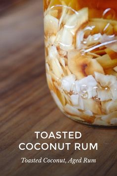 a jar filled with food sitting on top of a wooden table