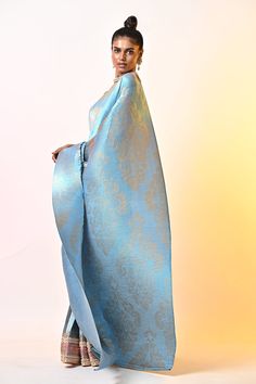 Metallic powder blue pleated saree with abstract print and hand embroidery. Comes with an unstitched blouse.
Components: 2
Pattern: Printed, Hand embroidered
Type Of Work: Abstract
Fabric: Pleated polyester mix
Color: Blue
Other Details: 
Note : Stitched blouse worn by the model is not for sale.
Occasion: Mehendi and Haldi,Sangeet - Aza Fashions Kiran Uttam Ghosh, Pleated Saree, Abstract Fabric, Metallic Powder, Blouse For Women, Mix Color, Fashion App, Blouse Online, Pattern Mixing