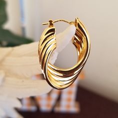 Lovely. New Vintage 14k Heavy Gold Hoop Earrings. 14k Italy. Been Tested As Well For 14k. I Just Love The Design On The Earrings. Gold Really Shiny And Bold. Nice Weight To Them. 6.7 Grams Of Gold Together Modern Twist Hoop Earrings As Gift With Polished Finish, Modern Twist Polished Hoop Earrings As Gift, Modern Twist Hoop Earrings As Gift, 14k Gold Shiny Finish Earrings For Anniversary, 14k Gold Earrings With Shiny Finish For Anniversary, Anniversary 14k Gold Earrings With Shiny Finish, Gold Plated Polished Hoop Earrings Gift, White Gold Hoop Earrings With Modern Twist, Modern Twist White Gold Hoop Earrings As Gift