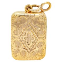 A fine signed Edwardian locket pendant for a necklace. In 14k gold. By Sloan & Co. A small hinged locket style box with etched and engraved decoration to the front, a hinged door that opens to reveal a hidden compartment, and a fixed bail with an attached jump ring. Marked to the interior 14 / Sloan & Co's trident maker's mark. Simply a wonderful Edwardian locket! (Chain for display only and not included.) Date: 20th Century Overall Condition: It is in overall good, as-pictured, used estate cond Antique Engraved Square Pendant Jewelry, Rectangular Vintage Charm Jewelry For Formal Occasions, Antique Square Locket Pendant Jewelry, Antique Square Pendant Locket Jewelry, Elegant Compact Locket Jewelry, Gold Rectangular Jewelry Keepsake, Gold Rectangular Locket Necklace, Gold Rectangular Keepsake Jewelry, Victorian Rectangular Locket Jewelry