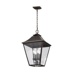 an outdoor hanging light fixture with three lights