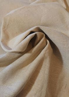 the fabric is very soft and light tan color, it looks like something from an old book