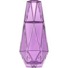 a purple glass vase sitting on top of a table