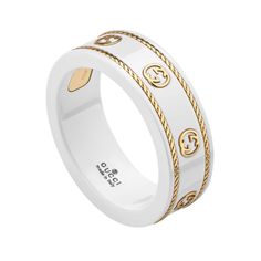 Add updated styling to your collection with this chic ring from Gucci. This unique ring is crafted in white zirconia and features the interlocking G design in 18k yellow gold in stations all the way around the band. Braided details in 18k yellow gold encircle the top and bottom of the band for added detail and interest. This ring measures 0.3 inches in width. Made in Italy. This ring is a size 7.25. Gucci Style #: YBC606826002015 Gucci Accessories Jewelry, G Ring, Chic Rings, Versace Jewelry, Gucci Jewelry, Zodiac Jewelry, Luxury Rings, Ladies Diamond Rings, Expensive Jewelry