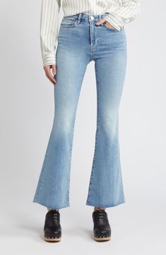 Raw hems relax the style of mid-rise flare jeans made from soft, lightweight stretch denim in a casual medium wash. 31" inseam; 21" leg opening; 11" front rise; 15" back rise (size 29) Zip fly with button closure Five-pocket style 63% organic cotton, 27% cotton, 5% recycled polyester, 5% elastane Machine wash, dry flat Imported Medium Wash Mid-rise Flares With Five Pockets, Mid-rise Medium Wash Flares With Five Pockets, Medium Wash Flared Hem Jeans For Spring, Spring Medium Wash Flared Hem Jeans, Mid-rise Medium Wash Flares For Spring, Mid-rise Flares With Frayed Hem For Spring, Spring Mid-rise Flares With Frayed Hem, Mid Rise Flare Jeans, Hairstyling Products