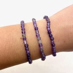 This listing is for one (1) amethyst bracelet. These are stock photos in which you will be hand selected a bracelet. You will receive one that is similar to the ones pictured.  These are one size: "one size fits all" These are best suited for wrists measuring 5.5-7 inches in diameter. They do stretch quite a bit past that as well (if needed). (I have quite small wrists and they fit me fine, they are not too loose though; my wrists are shown in the picture). They are strung on elastic string in o Amethyst Bracelet, Green Agate, Strawberry Quartz, Quartz Points, Pink Opal, Travel Pouch, Round Beads, Arm Band, One Pic