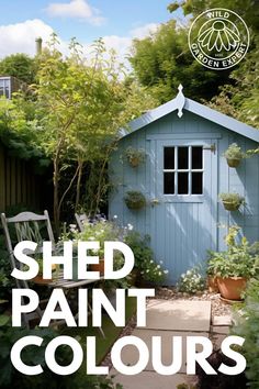 the shed is painted blue and has plants growing on it, along with a white chair