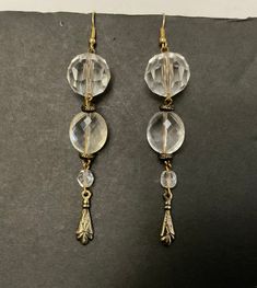 Vintage Clear Lucite Beads and Antique metal beads have combined for a pair of glitzy Glam style dangle Earrings...Features faceted Lucite beads that look so much like glass yet without the heavy weight...between are small antique bead spacers and a decorative antique metal   teardropStylish runway statement earrings that are the perfect accessary for that special fancy event. Measurements: 3 inches long...largest top bead over 18 mm (5/8") runway statement earrings Nice pre used condition...han Earrings Formal, Runway Earrings, Glitzy Glam, Fancy Event, Bead Drop Earrings, Bead Dangle Earrings, Jewelry Roll, Glam Style, Beaded Drop Earrings