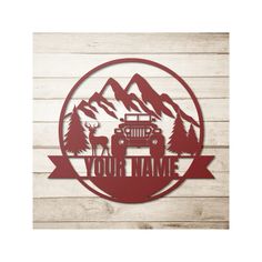 a metal sign that says you're name with an image of a truck and mountains