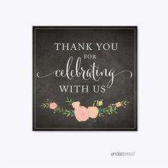 a chalkboard sign with flowers and the words thank you for celebrating with us on it