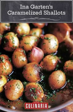 some onions are being cooked in a pan with herbs on top, and seasoning is sprinkled around them