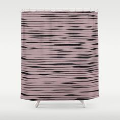 a pink shower curtain with black lines on it