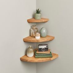 three wooden shelves with various items on them