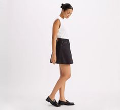 Mini Flounce Skirt - Black | Levi's® US Relaxed Mini Denim Skirt, Spring Modern Mini Skort, Modern Short Mini Skirt For Spring, Fitted Levi's Mini Skirt, Levi's Mini Skirt For Spring, Trendy Levi's Mini Skirt For Spring, Modern Mini Skort For Spring, Modern Lined Skort For Spring, Modern Spring Mini Skort