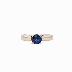 This beautiful ring features a 0.94 carat Blue Sapphire solitaire set in solid 14K gold. This Blue Sapphire ring makes a lovely September birthstone gift for your loved ones! This ring is made with solid 14K Gold. As listed, this ring is ready to ship. If you're interested in purchasing this setting with a different center stone please message us! Classic Crystal Ring With Birthstone In Round Cut, Classic Diamond Ring With Birthstone In Round Band, Classic Crystal Birthstone Ring With Round Cut, Classic Crystal Birthstone Ring For Formal Occasions, Classic Lab-created Sapphire Diamond Promise Ring, Lab-created Sapphire Promise Ring With Center Stone, Classic Yellow Gold Ring With Lab-created Sapphire, Classic Sapphire Birthstone Ring With Center Stone, Solitaire Birthstone Promise Ring With Round Band