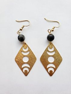 I make jewelry that I love and would wear! Everything in my shop is a complete reflection on my personal style!  Follow Birchwood Artistry on Facebook and Instagram!  https://www.facebook.com/birchwoodartistry https://www.instagram.com/birchwood.artistry/ These textured bass moon phase and gemstone earrings are beautiful! Bohemian Moon Phase Round Beaded Jewelry, Bohemian Moon Phase Dangle Earrings, Bohemian Moon Phase Drop Earrings, Bohemian Brass Earrings With Moon Phase Detail, Bohemian Brass Moon Phase Earrings, Bohemian Brass Earrings With Moon Phase, Bohemian Moon Phase Earrings For Festivals, Gold Feather Earrings, My Personal Style