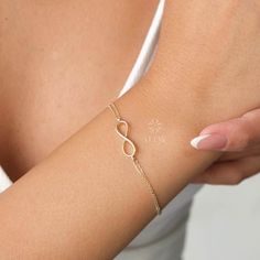 ABOUT PRODUCT  This 14K Gold Infinity Bracelet is suitable gift for girlfriend, mom and her. You can even buy as a birthday gift for your friends or anniversary gifts, If you want to add a special note we can write for you and put to inside of package. We manufacture our jewelry pieces with carefully and after production we double checking in quality control department. Our main idea is keep our items for daily wearing especially for minimalist jewelry pieces. 14K Gold Infinity Bracelet, Eternit Elegant Infinity Bracelets For Mother's Day, Elegant Infinity Bracelet For Mother's Day, Minimalist Infinity Bracelet As A Gift, Minimalist Infinity Bracelets For Gifts, Minimalist Infinity Bracelets As Gift, Minimalist Infinity Bracelet For Gift, Minimalist Infinity Bracelets For Anniversary, Minimalist Infinity Bracelet For Anniversary, Minimalist Infinity Bracelet