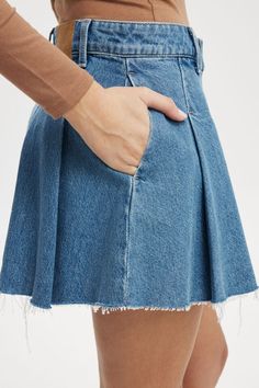 Pleated Denim Mini Skirt Cotton Pleated Skirt In Medium Wash, Cotton Pleated Short Denim Skirt, Short Pleated Cotton Denim Skirt, Denim Pleated Short Bottoms, Pleated Denim Blue Cotton Skirt, Denim Blue Cotton Pleated Skirt, Pleated Medium Wash Denim Bottoms, Relaxed Cotton Pleated Denim Skirt, Trendy Pleated Medium Wash Bottoms