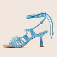 Elevate your style with these chic blue heeled sandals featuring a square toe, floral strappy design, and lace-up closure. Perfect for adding a touch of sophistication to any outfit. Color: Blue Heel Type: Flared heel Heel Height: 2.56'' / 65 mm approx Product measurements were taken using size 8. Please note that measurements may vary by size. Toe: Open square toe Floral strappy design Lace-up design Handcrafted US sizing. Fits true to size. Summer Lace-up Sandals With Heel Strap And Square Toe, Summer Lace-up Ankle Strap Sandals With Padded Heel, Summer Ankle Strap Lace-up Sandals With Padded Heel, Summer Party Lace-up Sandals With Square Toe, Spring Ankle Strap Lace-up Sandals With Wrapped Heel, Spring Open Toe Lace-up Sandals With Heel Strap, Spring Lace-up Sandals With Wrapped Heel And Ankle Strap, Spring Open Toe Lace-up Sandals With Padded Heel, Square Toe Lace-up Sandals For Evening Summer Events