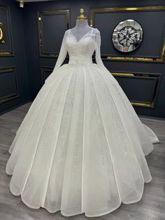 Magnificent Long-Sleeve Beaded Ball Gown with Sweetheart Neckline and Sparkling Embellishments Beaded Ball Gown, Gown Silhouette, Beaded Ball, Beaded Bodice, Luxurious Fabric, Stunning Gowns, Grand Entrance, Sheer Fabric, Sheer Sleeves