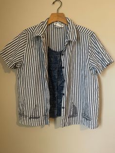 Cute vintage blue and white striped shirt decorated with boats and underneath it is an attached vest with boats. Cotton. Casual Corner label. Tag size is large but fit's medium and maybe large if not really busty.  Arm pit= 20 Length = 22.5 (looks petite) Navy Tops With Striped Collar For Summer, Navy Top With Striped Collar For Summer, Sailor Style Striped Cotton Top, Striped Sailor Style Cotton Top, Striped Nautical Tops For Summer, Nautical Striped Tops For Summer, Beach Tops With Striped Collar And Short Sleeves, Summer Sailor Style Short Sleeve Tops, Striped Sailor Style Top For Spring