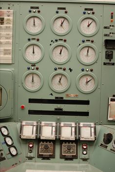 the control panel of an airplane with multiple gauges and dials on each side