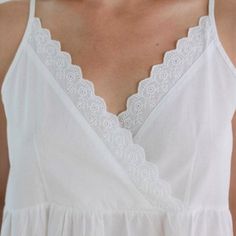 This popular cross over v-neck nightie is a new style that is great for nights at home when you want to look cute in something comfortable. The nightgown features spaghetti strap, eyelet lace trim on the bodice, and a hem stitch lace inset 5" above the knee. Please note: in some photos, there is no hem stitch lace on the hem but the Cara will be shipped to you with the hem stitch lace on the hem and it is lovely! Product Overview: Sizing information: XSmall (US 0) Small (US 2-4) Medium (US 6-8) White Cotton Nightgown, Cotton Nightgowns, Victorian Nightgown, Cotton Nighties, Hem Stitch, Cotton Nightgown, Cotton Sleepwear, Blue And White Style, Nightgowns For Women