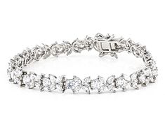 Bella Luce® white diamond simulant 15.86ctw round and marquise, platinum over sterling silver tennis bracelet. Measures approximately 7.25"-8" L x 0.25" W and has a hidden box clasp closure. Diamond equivalent weight is 9.61ctw. Silver Marquise Tennis Bracelet Fine Jewelry, Silver Marquise Diamond Bracelet With Prong Setting, Silver Marquise Diamond Bracelet For Anniversary, Silver Marquise Jubilee Tennis Bracelet, Silver Marquise Diamond Bracelet Gift, Silver Tennis Bracelet, Diamond Simulant, Box Clasp, Tennis Bracelet