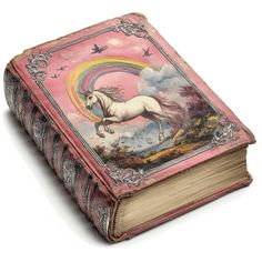 an old book with a unicorn painted on the front cover and rainbow in the background