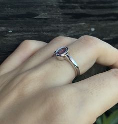 "A Dainty Stackable Oval Genuine Purple Amethyst set in a simple bezel handcrafted in sterling silver is a great birthstone ring for those February Birthdays! This also makes an ideal ring to stack with our other gemstone ring or wear it as a MIDI/PINKY Ring. Wrapped in a box ready for gift giving. BELESAS and 925 hallmarked inside the ring. (r-gem-4) Ring Info ----------------------------------------- Genuine Purple Amethyst measure 6mm x 8mm High Quality 925 Sterling Silver Tarnish Resistant S Oval Gemstone Stackable Rings For Promise, Oval Gemstone Stackable Promise Rings, Promise Solitaire Stackable Rings, Dainty Oval Cabochon Gemstone Rings, Oval Solitaire Stackable Promise Rings, Oval Birthstone Promise Ring With Gemstone, Oval Sapphire Ring With Bezel Setting For Promise, Adjustable Oval Birthstone Ring With Gemstone, Adjustable Oval Gemstone Birthstone Ring