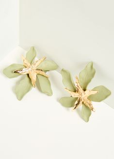 Textured petals are beautifully realistic as they're illuminated by gilded accents on our clip-on earrings. Gold Flower Clip-on Earrings For Spring, Gold Clip-on Earrings For Spring Party, Gold Petal Earrings For Party, Spring Party Gold Clip-on Earrings, Flower Clip, Ashley Stewart, Accessories Jewelry Earrings, Gold Floral, Gold Texture