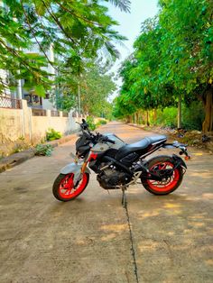 a motorcycle parked on the side of a road