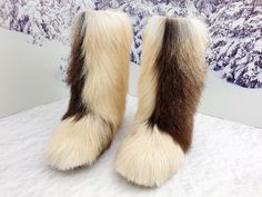 Exclusive brown white color fur boots! They are perfect combination of gorgeous look and warmth. Lined by a genuine sheepskin. Outside part is made of a real goat fur. Boots are designed for women who love the uniqueness and warmth, as withstand up to 50 degrees Celsius below zero. COLORS: EACH PAIR IS INDIVIDUAL! it can be more brown or black or white. Length and thickness of fur is diffrenet too. Please, contact. These beautiful boots are available in different natural color shades: brown, whi White Sheepskin Boots For Winter, White Sheepskin Winter Boots, Winter White Sheepskin Boots, White Faux Fur Trimmed Boots, Cloth Hacks, Yeti Boots, Women Winter Boots, White Goat, Boots Long