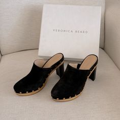 Gorgeous Veronica Beard Platform Clogs. Grita Clog In Black Suede Leather. Leather Lined. Gold Accent Rivets. Almond Toe. These Are Truly Beautiful And Look Fantastic With Flares Or Bootcut Jeans!! New With All Packaging And Dust Bag. Chic Slip-on Clogs With Reinforced Heel, Chic High Heel Clogs With Reinforced Heel, Chic Suede Clogs With Wooden Heel, Chic Suede Clogs With Stacked Heel, Chic Clogs With Rubber Sole And Round Toe, Elegant Black Clogs With Reinforced Heel, Chic Clogs With Leather Sole And Round Toe, Chic Clogs With Platform And Almond Toe, Chic Platform Clogs With Almond Toe